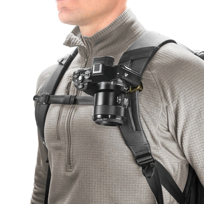 Person wearing a camera on a shoulder attached to Kelp color Capture plate