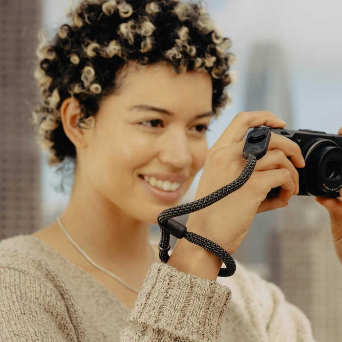 Person taking photo with a Black Rope Cuff around their wrist