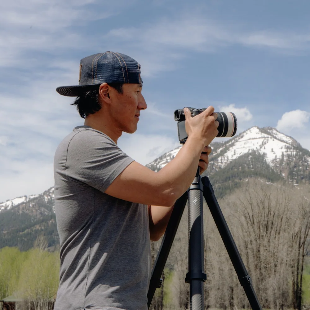 Jimmy taking a photograph with a camera on a pro tripod