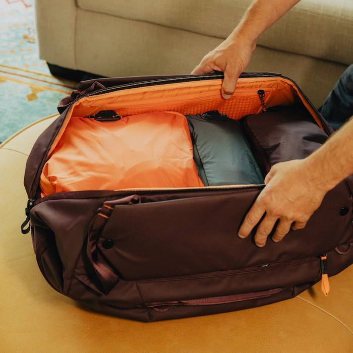 Open Travel Duffelpack 65L Eclipse with packing cubes inside